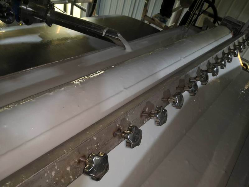 Coating slurry laying process